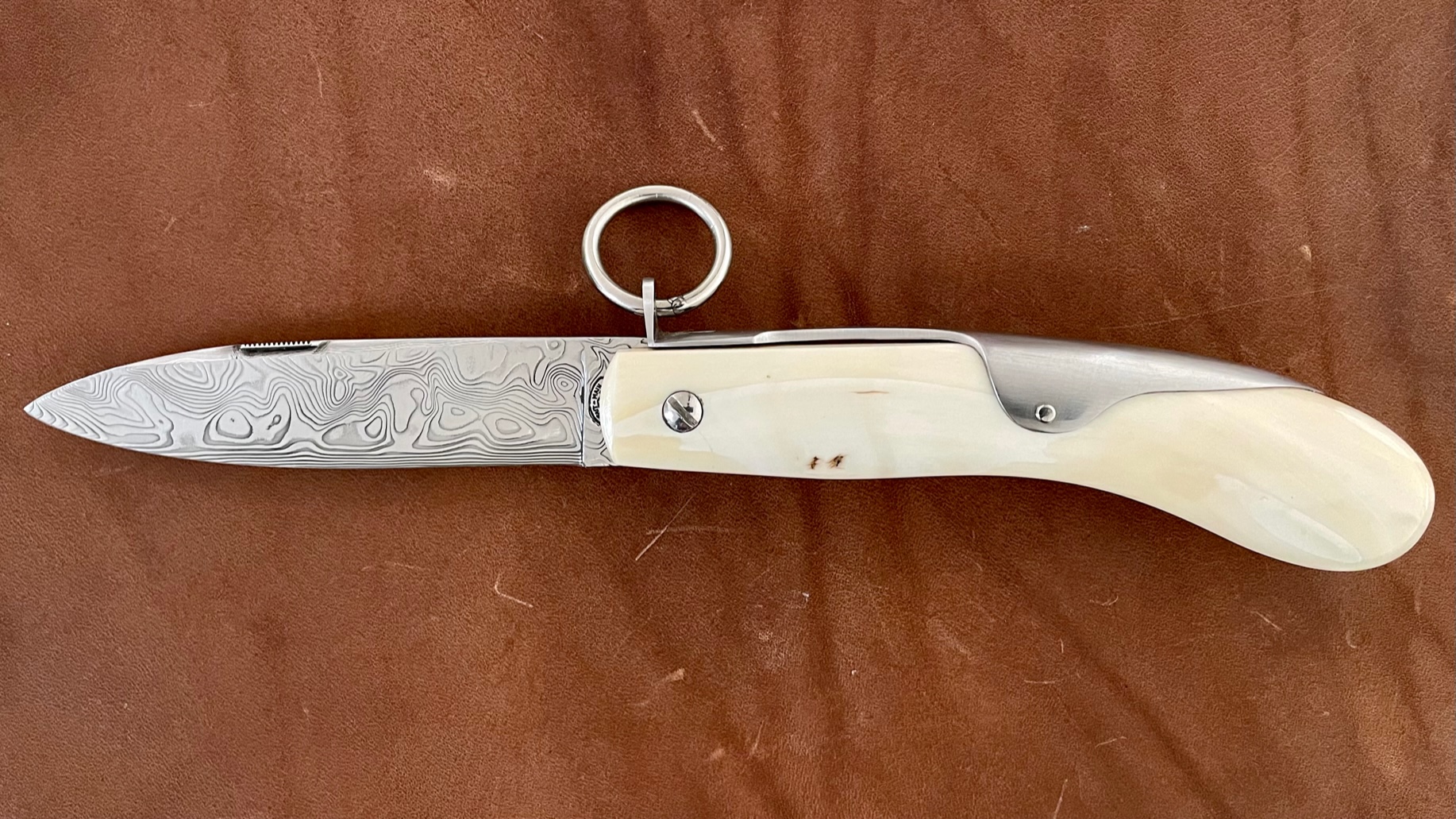 Couteau pliant modèle "Milan" de Mongin - 12 CM défense de phacochère  damas
